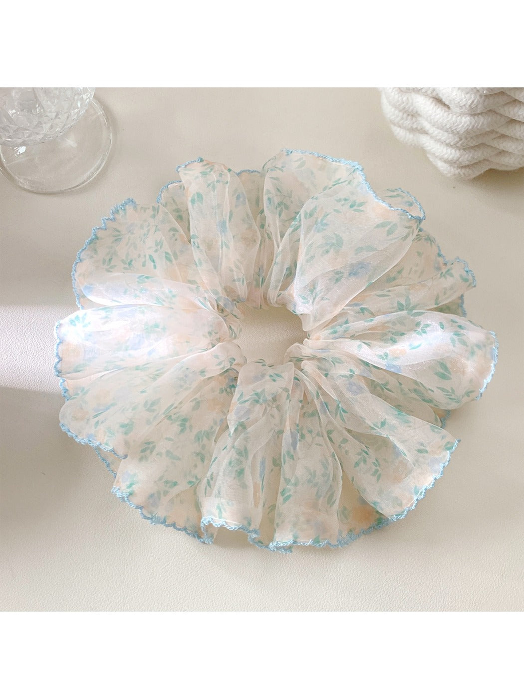 Gifty scrunchie packaged in branded box with clear window