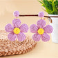 Earedge knitted flower earrings in multiple colors arranged in a circle