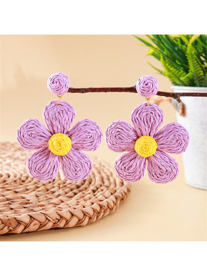 Earedge knitted flower earrings in multiple colors arranged in a circle