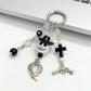 Minimalist ghost-shaped pendant keychain in white on a plain background