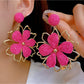 Earedge stylish flower shaped drop earrings displayed on a white background