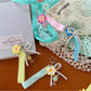 Keypus - Plumeria Bow Ice Cream Accent Bag Charm Keychain