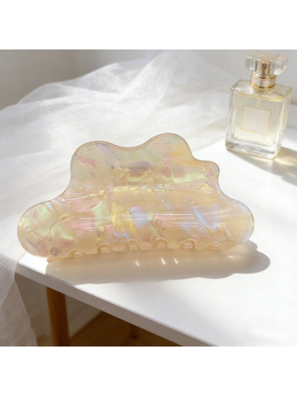 Beau holographic claw clip reflecting light with rainbow colors
