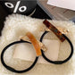 Gifty - Stylish X Shaped Hair Tie