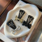 Beau - Faux Leather Bow Triangle Snap Hair Clip