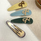 Beau - Bow Embellished Oval Hair Clip