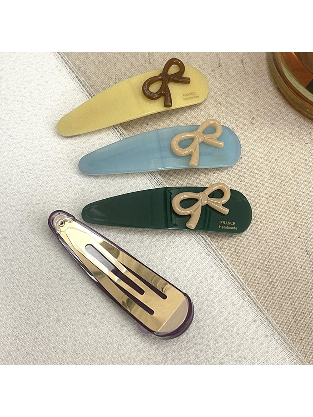Beau - Bow Embellished Oval Hair Clip