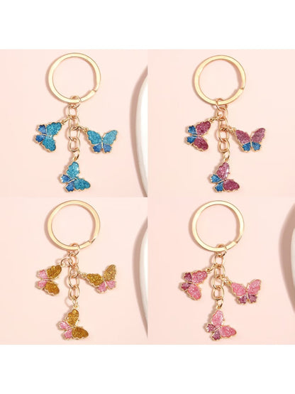 Color block butterfly shaped keychain with vibrant pastel colors on a white background