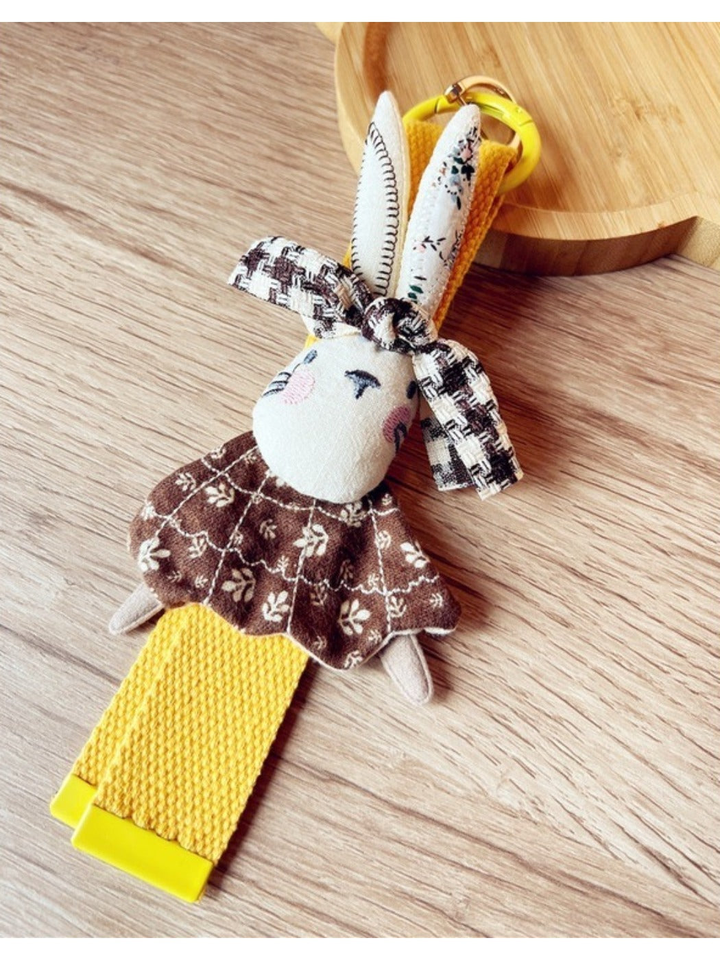 Fabric rabbit keychain displayed on a white background showing full shape and design