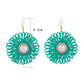 Pair of Earedge raffia woven flower-shaped earrings displayed on white background