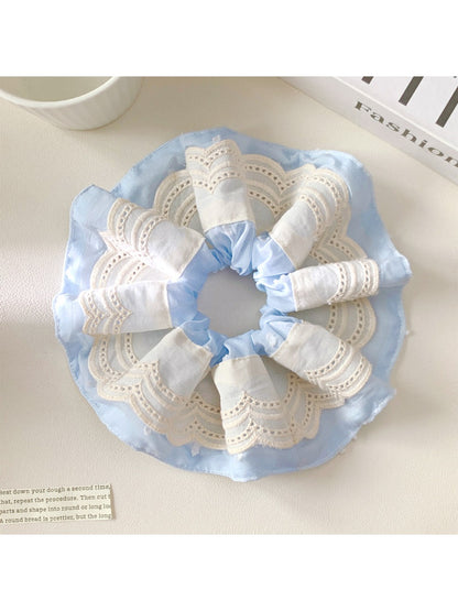 Close-up of Gifty color block scrunchie showing fabric texture and stitching details