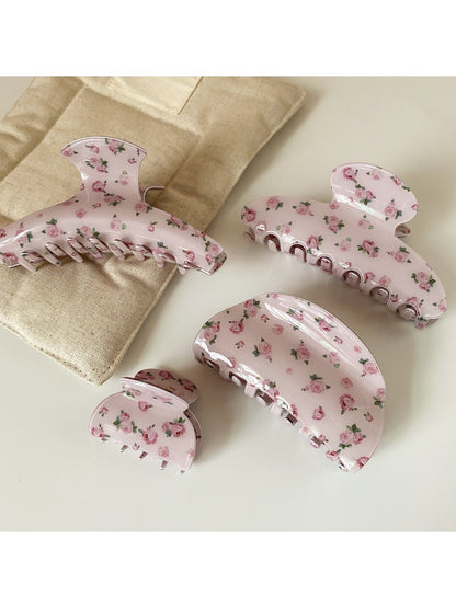Side view of Beau pink rose print hair claw clip highlighting clip mechanism