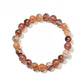 Lovra colorful crystal beaded bracelet coiled to show full length and bead variety