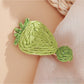 Beau raffia woven strawberry flower hair clip with intricate weaving pattern