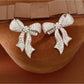 Earedge - Synthetic Zircon Bow Stud Earrings Pair