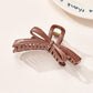 Beau - Curved Plastic Bow Hair Styling Claw Clip