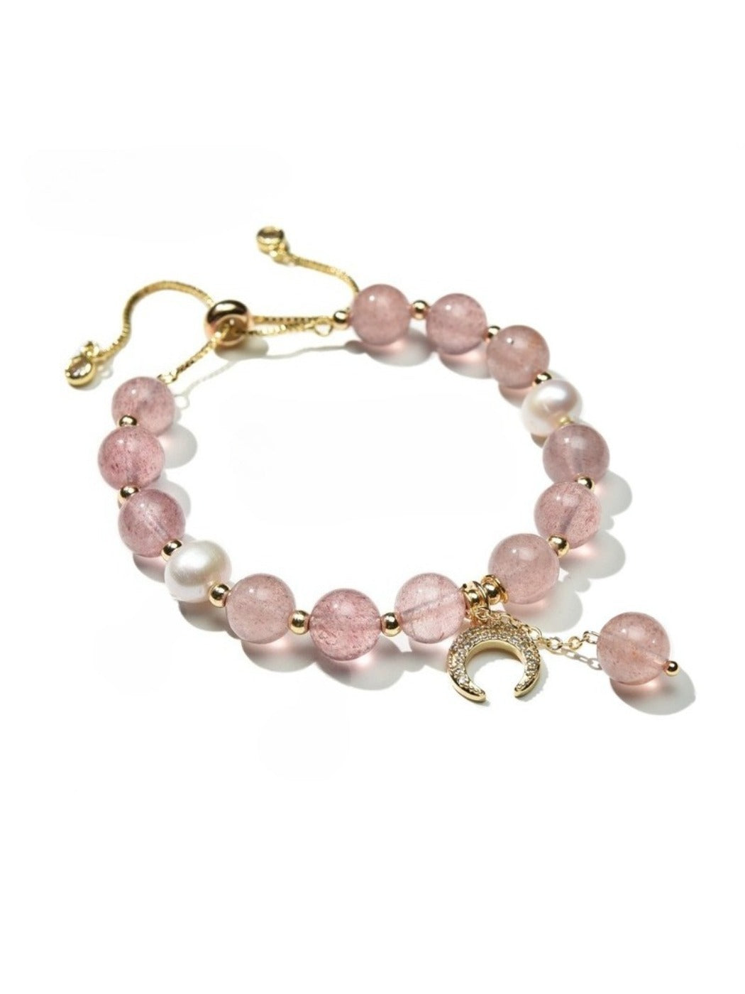 Lovra pink crystal beaded bracelet styled with complementary jewelry on a model's wrist