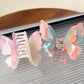 Close-up of Beau butterfly claw clip showing layered design and clasp mechanism