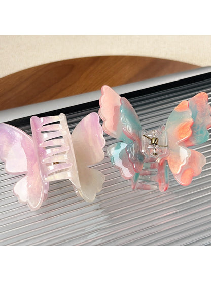 Close-up of Beau butterfly claw clip showing layered design and clasp mechanism
