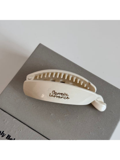 Beau minimalist stick hair clip displayed alongside matching hair accessories