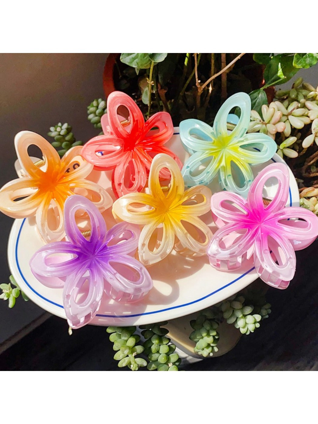 Close-up of Beau flower hair claw clip showing intricate openwork design