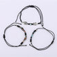Close-up of Lovra alloy charm small bead bracelet showing detailed charm and bead texture