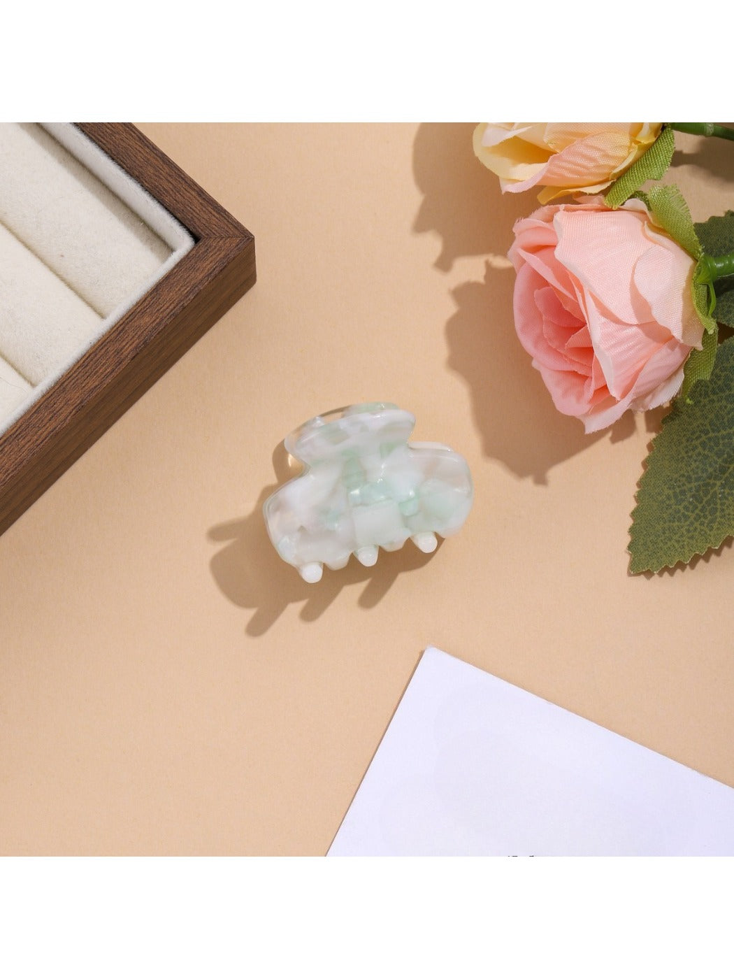 Beau vibrant acetate hair clip angled to show thickness and material texture