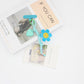Keypus - Sunflower Smiley-Shaped Keychain