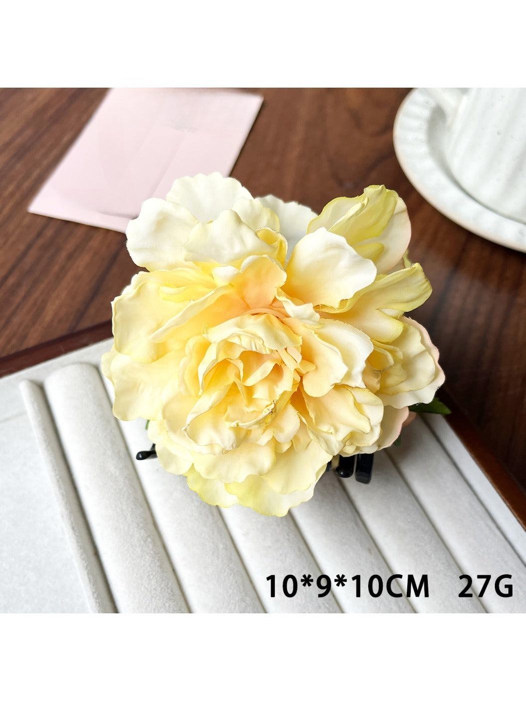 Beau peony flower claw clip angled to show petals and clip teeth