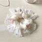 Gifty minimalist modern floral scrunchie displayed on a white background