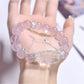 Side view of Lovra bracelet featuring pink crystal fox charm