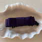 Beau vintage bow hair clip paired with casual outfit on model