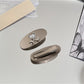 Beau - Oval Alloy Starfish Detail Side Hair Clip