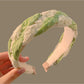 Gifty Happy Lace colored headband in pastel blue with detailed lace overlay
