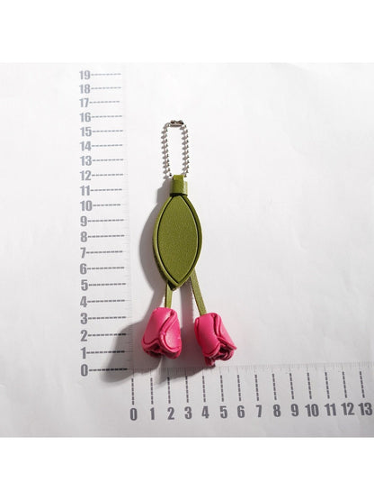 Tulip flower keychain attached to a silver keyring on a white background