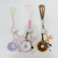 Side view of the donut keychain showing its thickness and texture