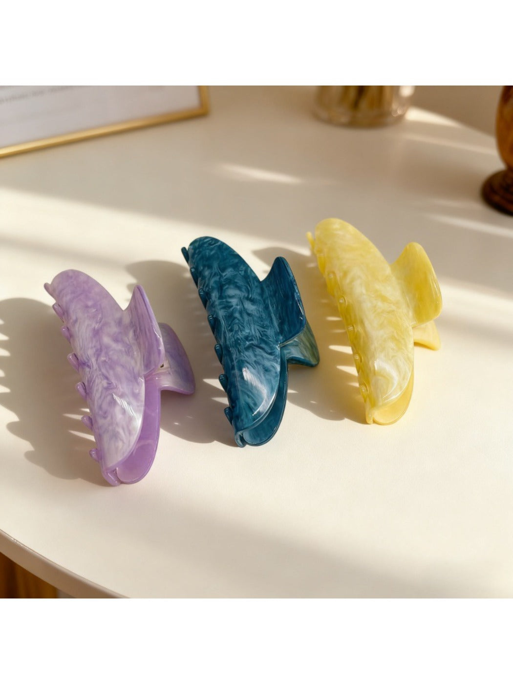 Close-up of Beau pastel pink claw clip showing smooth matte finish