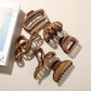 Beau - Glossy PS Curved Hollow Design Claw Clip
