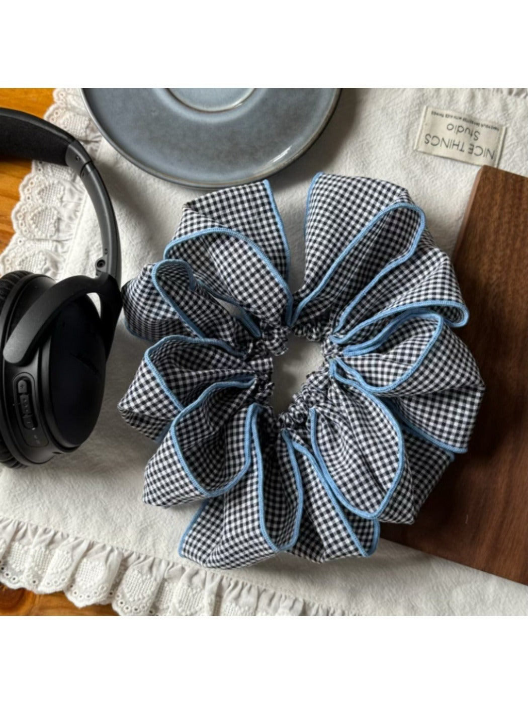 Gifty scrunchie styled in hair with visible checked pattern