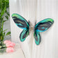 Beau butterfly hair claw clip in natural light highlighting glossy finish