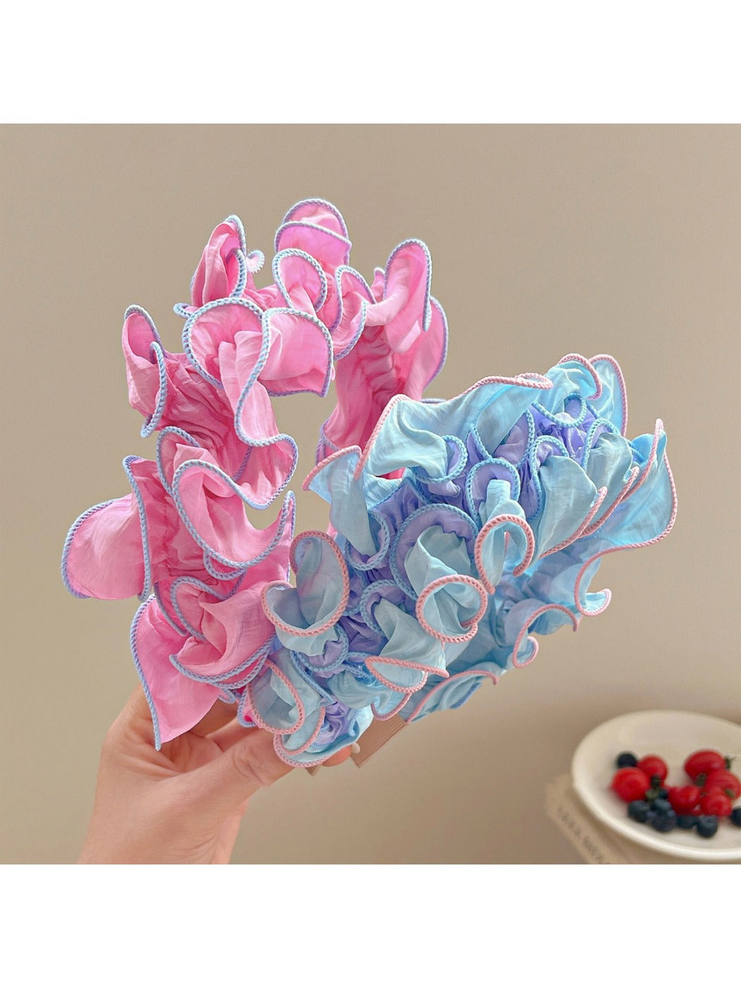 Side view of Gifty ruffle pleated fabric headband showing pleated texture