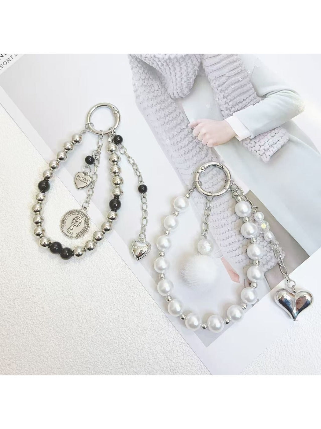 Keypus beaded heart pendant keychain attached to a silver keyring on a white background