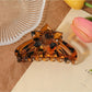 Beau - Elegant Flower Shaped Long Strip Claw Clip