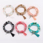 Lovra boho multi-row beaded bracelet with colorful tassels on a white background