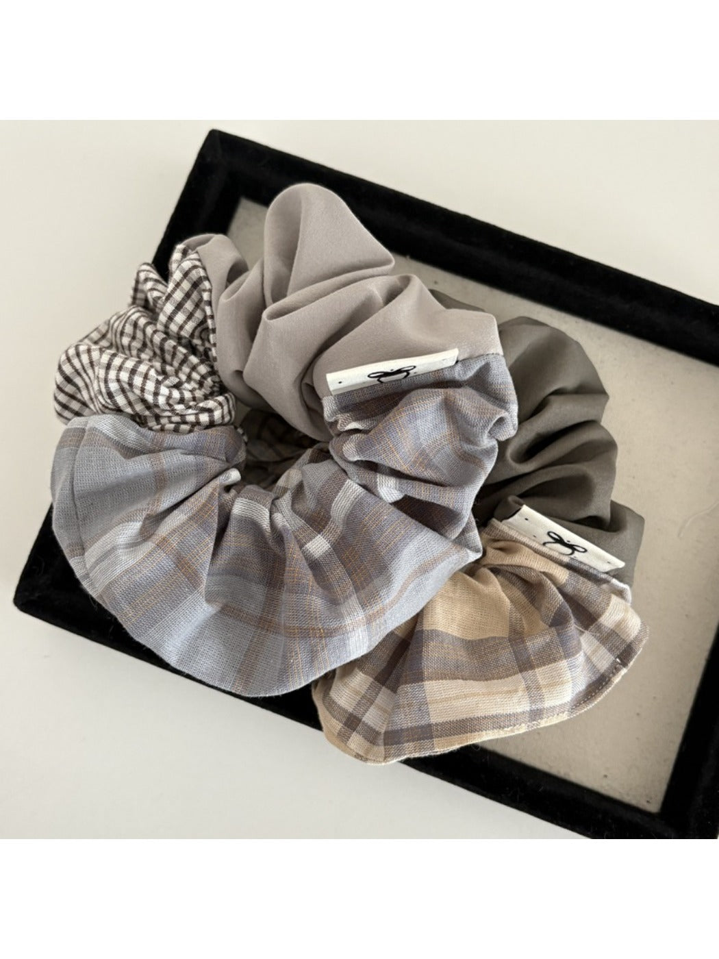 Gifty scrunchie displayed on a white background showing full circular shape