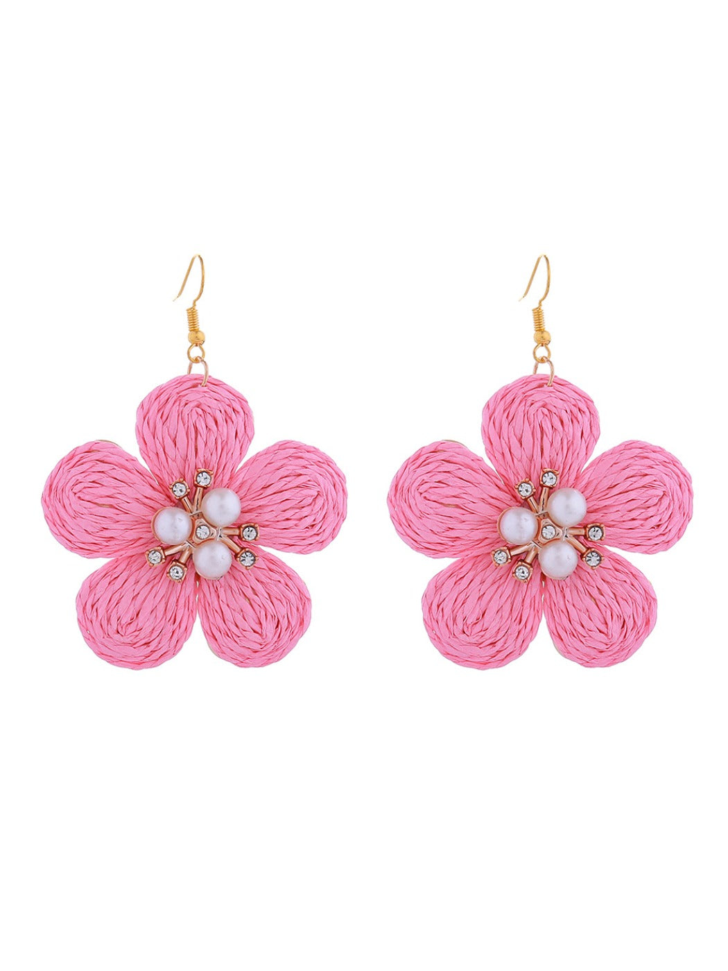 Earedge raffia flower earrings paired with casual outfit on model for styling inspiration