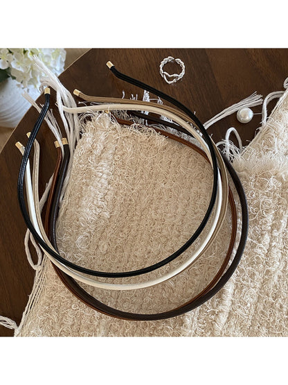 Gifty solid color headband displayed flat with clean, simple design