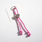 Close-up of colorful twisted rope heart keychain with metal keyring