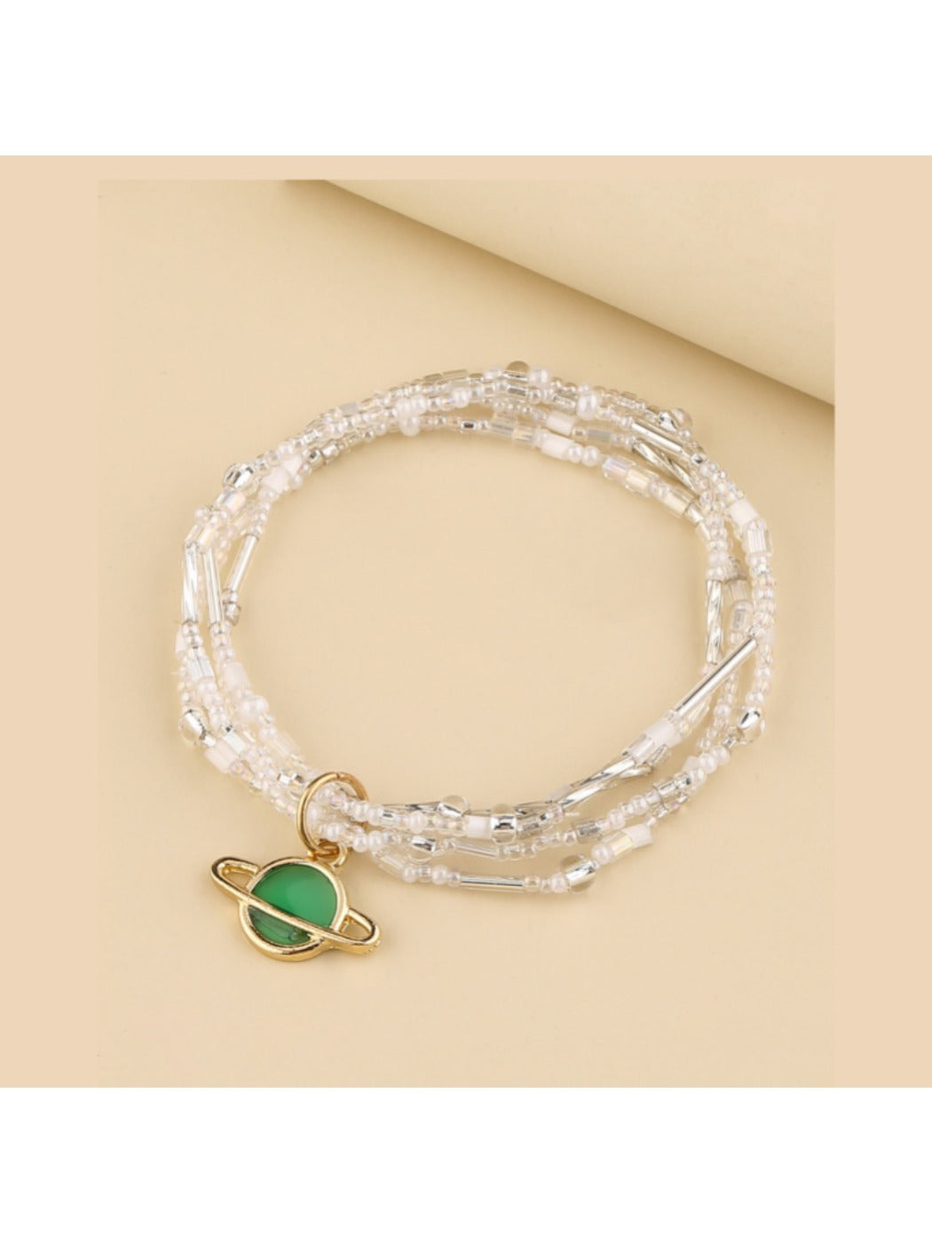 Lovra multi strand beaded bracelet displayed flat highlighting its minimalist design