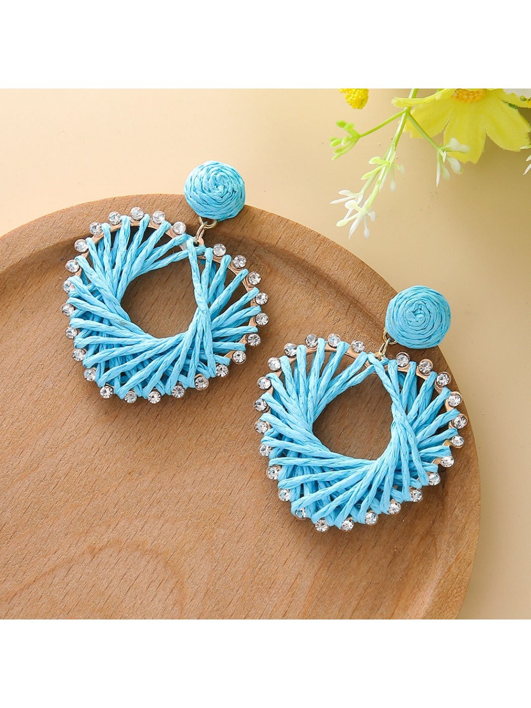 Model wearing elegant heart-shaped drop earrings with casual outfit